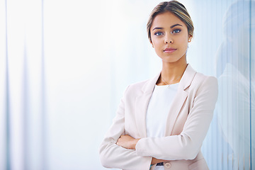 Image showing Business woman, arms crossed and confident in portrait, paralegal at law firm and serious with pride. Young professional, career and legal expert at office with mockup space and corporate job