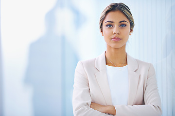 Image showing Business woman, arms crossed and serious in portrait, paralegal at law firm and confidence with pride. Young professional, career and legal expert at office with mockup space and corporate job