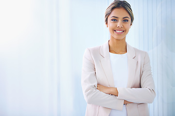 Image showing Business woman, arms crossed and smile in portrait, paralegal at law firm and confidence with pride. Young professional, happy in career and legal expert at office with mockup space and corporate job