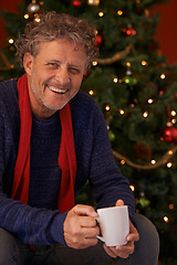 Image showing Happy man, portrait and Christmas tree with coffee, mug or cup of tea for festive season or celebration at home. Face of senior or male person with smile for hot beverage, December holiday or weekend