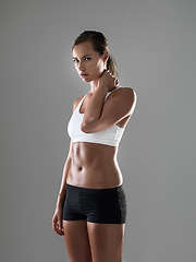 Image showing Woman, portrait and workout sweat for exercise health in studio for performance, grey background or fitness. Female person, hand and physical practice for weight loss or activity, cardio or mockup