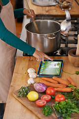 Image showing Chef, cooking and tablet with vegetables in kitchen as nutrition meal or online recipe, screen or website. Person, home and raw ingredients with ux internet search for vegan eating, prepare or hungry