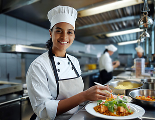 Image showing female chef in a commercial kitchen