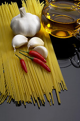 Image showing pasta garlic extra virgin olive oil and red chili pepper