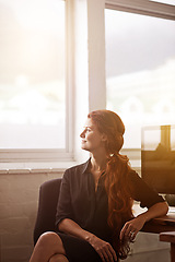 Image showing Woman, work and think with smile at window for company idea, vision and growth with future in startup business, company growth. Female person, entrepreneur and desk with computer in office as hr.