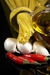Image showing pasta garlic extra virgin olive oil and red chili pepper