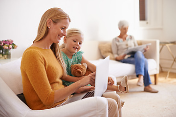 Image showing Child, laptop and internet game at a home with family, girl and mother together with education. Learning, online and senior woman with kid and mom with love, support and care in a house with tech