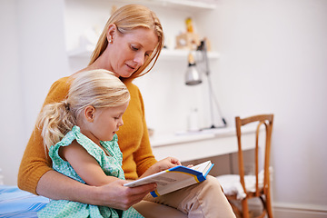 Image showing Mother, child and youth book for reading in bedroom at family home with fantasy story for development. Love, care and support of a mom with a kid together with bonding and learning for education