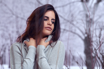Image showing Winter, cold and woman outdoor in snow for fashion with turtle neck, jersey and warm top by tree in nature. Female person, Mexican lady and gen z girl with beauty for style, clothes and thinking