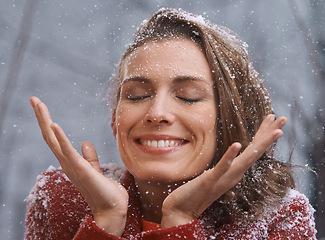 Image showing Happy, smile and woman with snow relax outdoors for season, snowing weather and cold climate. Eyes closed, fashion and person in nature on winter holiday, travel vacation and weekend in Switzerland