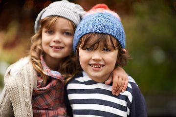 Image showing Kids, love and siblings portrait in a park for travel, adventure or bonding on autumn journey in nature. Family, face and children hug in a forest for explore, playing or fun games in Canada outdoor