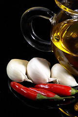 Image showing garlic extra virgin olive oil and red chili pepper