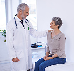Image showing Healthcare, support and senior woman with doctor in a consultation room for examination, results or help. Hospital, face and elderly patient consulting health expert for medical, diagnosis and advice