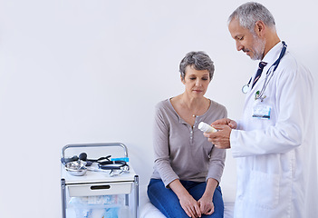 Image showing Hospital, consulting and doctor with pills for woman for prescription, medicine and treatment. Healthcare, medication and senior person in consultation for medical service, wellness and diagnosis