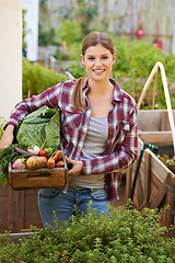 Image showing Happy woman, portrait and farmer with box of vegetables in garden or harvest for crops and nature resources. Female person with smile holding a crate of organic veg, natural growth or fresh produce