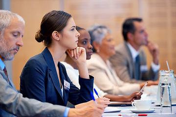 Image showing Boardroom, listening and employees with notes in meeting for business for discussion of stock market. Directors, women and male people in collaboration for strategy in sales, networking and talk