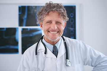 Image showing Senior man, doctor and happy portrait in office for healthcare, medical support and medicine career with stethoscope. Mature, face and health expert with smile or confidence for radiology in clinic