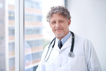 Image showing Mature man, doctor and happy portrait in office for healthcare, medical support and medicine career with stethoscope. Senior, face and health expert with smile or confidence for radiology in clinic