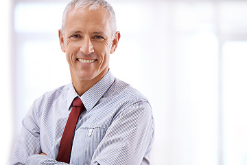 Image showing Smile, portrait and mature businessman with arms crossed, ceo or senior manager at startup office. Relax, confidence and face of business owner, boss or entrepreneur at professional agency with pride