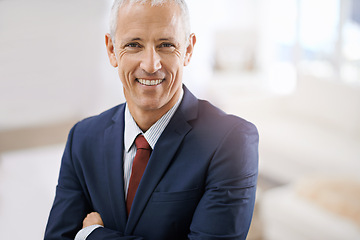 Image showing Smile, portrait and mature businessman, professional or senior manager at corporate startup office. Arms crossed, confidence or happy face of business owner, boss or entrepreneur at agency with pride