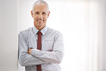 Image showing Portrait, senior man and professional with arms crossed, mockup space or agent in workplace. Face, mature person or entrepreneur with confidence or employee with startup or corporate with business