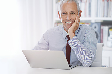 Image showing Portrait, laptop and happy senior businessman in office planning or checking email, review or social media feedback. Face, smile or old male executive with pc for online, research or communication