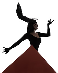 Image showing Bird, fashion and woman in a studio with abstract shape, feather and art with unique creativity. Illusion, silhouette and shadow with fantasy, triangle and graphic with style and white background