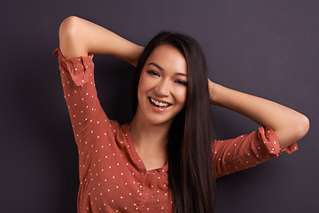 Image showing Portrait, fashion and woman in studio background, pride and cool for trendy style. Female model, smile and confidence with happiness, stylish and edgy girl in casual outfit or clothes from mexico