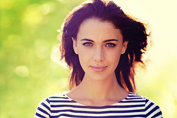 Image showing Woman, portrait and confidence with nature, sunshine and park for happiness and wellness. Person, joy and bokeh for closeup, glow or happy for summer relax and adventure outside in garden with grass