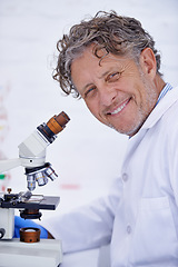 Image showing Science, microscope and portrait of doctor in laboratory for research, test or results for medical career. Healthcare worker, professional or scientist with chemistry, analysis or particles for study