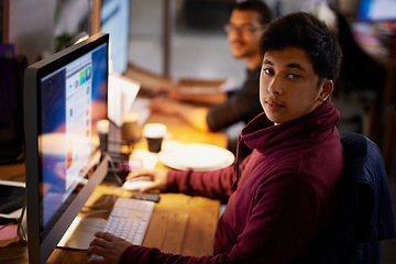 Image showing Night, office and portrait of man with computer for online work as programmer or software developer for company. Male person, serious and technology for cloud engineer for websites and app designs.