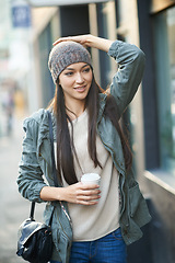 Image showing Thinking, holiday and city with woman, coffee and morning walk with fashion and getaway trip. Person, New York and girl in a road with tea or cappuccino with ideas or urban town with vacation or cold