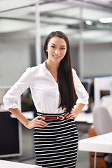 Image showing Portrait, young and business woman with confidence in workplace and professional person with ambition. Happy, face and entrepreneur for job satisfaction, pride and growth in career in startup company