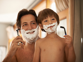 Image showing Father, son and teaching for shave, bathroom and mentor with healthy hygiene or routine. Man, child and skincare for smile, growth or childhood development or bonding with razor and concentration