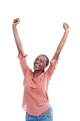 Image showing Excited, black woman and celebration in studio for success, winning or achievement with arms raised. Happy, cheers and person with victory, good news or bonus promotion isolated on a white background