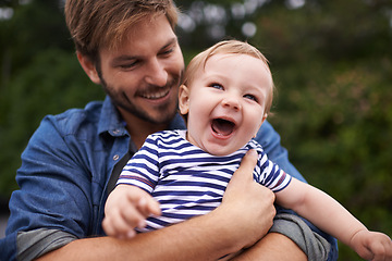 Image showing Outdoor, tickling and father with baby in park, love and bonding together for child growth or development. Happy family, dad and holding son to play on holiday, wellness and relax in nature for fun