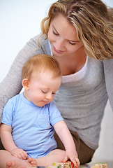 Image showing Baby, play and happy with mother, relaxing and love together with child and care for motherhood. Infant, mom and smile for affection, nurture and home for growth and babysitting with family bonding