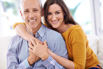 Image showing Happy couple, age difference and smile in portrait, love with unique relationship and support for trust at home. Senior man, young woman in marriage, commitment and loyalty with hug and pride