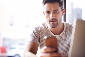 Image showing Man, coffee shop and freelancer phone or laptop, communication and website for information. Male person, bistro and app for conversation, social media and remote work in restaurant for research