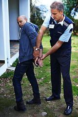 Image showing Police officer, handcuffs and outdoor to arrest man for crime with safety, protection or security. People, law enforcement and government service for justice, peace or authority for danger in society