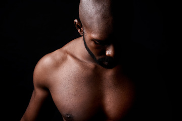 Image showing Black man, muscle and fitness with shadow for workout or exercise on a dark studio background. Closeup of young African male person or bodybuilder with masculine or muscular body on mockup space