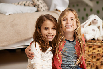 Image showing Happy, hug and portrait of children in bedroom for relaxing, bonding and playing with toys in home. Night, friends and young girls on floor embrace for childhood, fun and happiness in house together