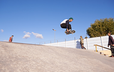Image showing Skateboard, energy and man with ramp, training and people with competition and challenge with performance. Adventure, jump or skater with practice for technique and cardio with balance or sunshine