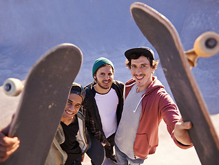 Image showing Portrait, skateboard and friends at a city park for training, fun or bonding session from above. Happy, face or top view of gen z skater men outdoor for travel, vacation or weekend reunion with hobby