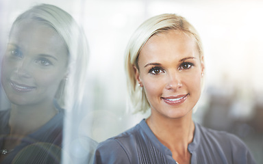 Image showing Portrait, smile and woman at office window with confidence, opportunity and career in HR consulting business. Face, workplace and happy businesswoman with pride at professional human resources agency