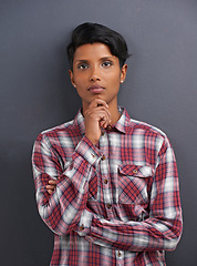 Image showing Portrait, serious and Indian person with designer and gray background at a creative agency office. Hipster, confidence and non binary employee with modern and casual clothing with fashion and style