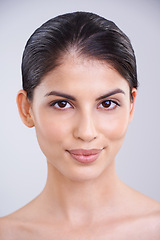 Image showing Beauty, face and dermatology with woman, cosmetic care and wellness in headshot isolated on grey background. Clean, natural and shine in portrait for skincare, healthy skin and hygiene in studio