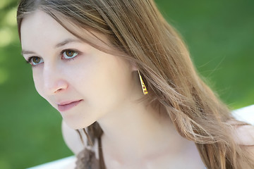 Image showing green-eyed girl with long hair