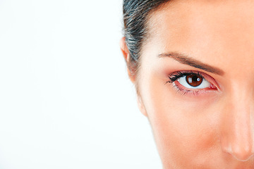 Image showing Woman, portrait and eyes in studio for makeup, closeup or cosmetic results with mockup on white background. Face, space and female model half with glowing skin confidence, shine or glamour eyeshadow