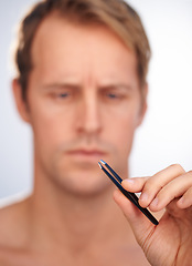 Image showing Man, hand and tweezers or beauty grooming in studio or hair removal treatment, transformation or skincare. Male person, tool and wellness routine on white background or hygiene, cleaning or cosmetic